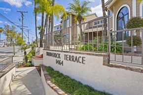 Anaheim apartment for rent - A building with the name "Woodstock Terrace" is visible.