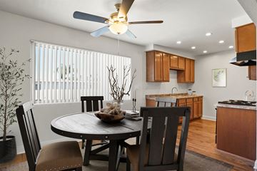 Santa Ana apartment for rent - A dining room with a table and chairs.