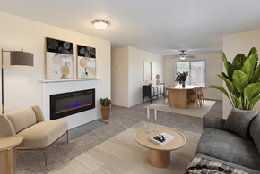 Colorado Springs apartment for rent - A modern living room with a fireplace and a dining area.