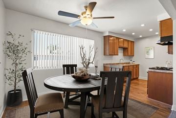 Anaheim apartment for rent - A dining room with a round table and chairs.