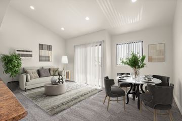 Anaheim apartment for rent - A modern living room with a grey sofa, a grey coffee table, a grey rug, a grey dining table with grey chairs, a potted plant, and a wooden coffee table.
