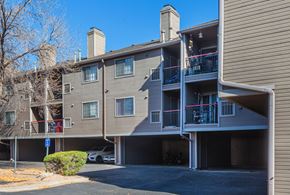 Littleton apartment for rent - A building with a car parked in front of it.