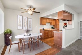 Anaheim apartment for rent - A dining room with a white table and chairs.