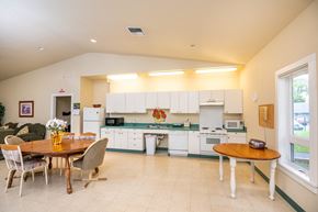Scappoose apartment for rent - a kitchen and dining room with a table and chairs