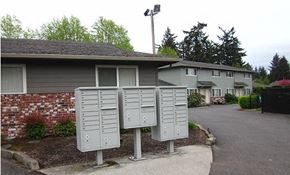Portland apartment for rent - a house with several mailboxes in front of it