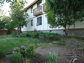 Leavenworth apartment for rent - the side of a house with a garden in front of it