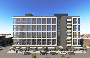 Portland apartment for rent - A modern building with a glass facade and a parking lot in front.