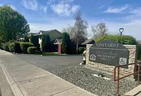 Grandview apartment for rent - A sign for Vineyard I is in front of a house.
