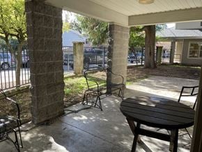 Portland apartment for rent - A patio with a table and chairs is shown.