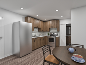 Vancouver apartment for rent - A modern kitchen with a wooden cabinetry and a refrigerator.