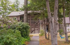 Florence apartment for rent - a house with trees and a sidewalk in front of it