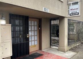 Portland apartment for rent - a building with two doors and a sign for an office