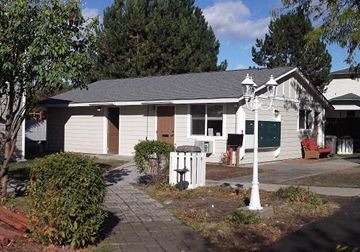 Ellensburg apartment for rent - a white house with a street light in front of it
