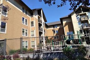 Portland apartment for rent - a picture of an apartment complex with a slide