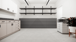 Portland apartment for rent - A modern kitchen with white cabinets and a grey countertop.