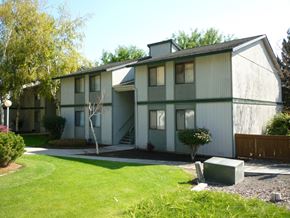 Selah apartment for rent - a gray and with a lawn and a driveway