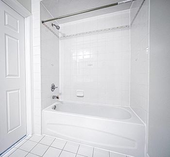 Large soaking tub in bathroom