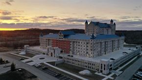 Grandville apartment for rent - an aerial view of a large building at sunset