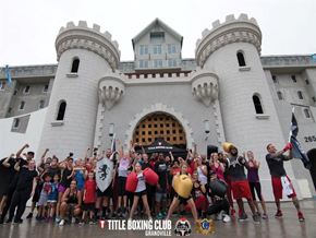 Grandville apartment for rent - a large group of people posing in front of a castle