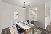 Herndon apartment for rent - A dining room with a white table and chairs.