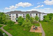 Ashburn apartment for rent - Apartment complex with a playground in the front.