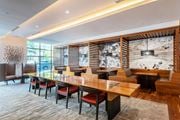 Arlington apartment for rent - A modern dining room with a long table and chairs.