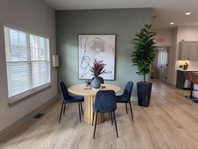 Charlestown apartment for rent - A dining room with a round table and chairs.