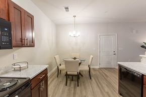 Charlestown apartment for rent - A kitchen with a table and chairs.