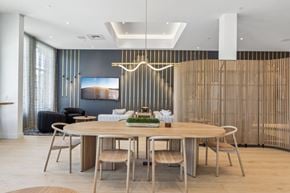 Danvers apartment for rent - A modern dining room with a round table and chairs.