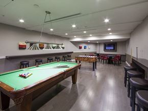 Etobicoke apartment for rent - we have a large games room with a pool table and a foosball table