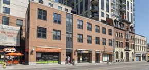 Toronto apartment for rent - A red brick building with a Subway restaurant on the ground floor.