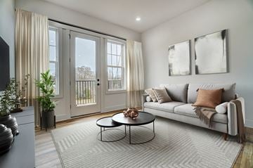 Belmont apartment for rent - a living room with a couch and a coffee table