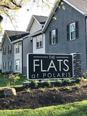 Westerville apartment for rent - the flats at polaris sign in front of a house