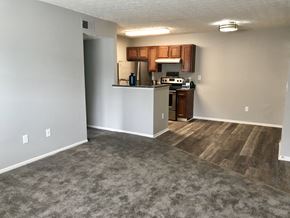 Westerville apartment for rent - an empty living room with a kitchen in it