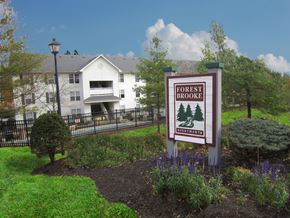 Delaware apartment for rent - A sign that says Forest Brook in front of a building.