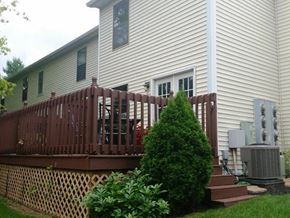 Worthington townhouse for rent - a white house with a fence in front of it