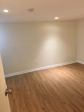 Worthington apartment for rent - an empty room with wooden floors and white walls