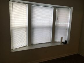Worthington apartment for rent - a window with three blinds in a room