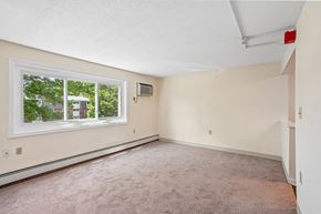 Seabrook apartment for rent - A room with a window and a carpeted floor.