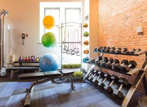Boston apartment for rent - a gym with a bunch of weights on a rack