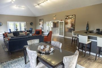 Derry apartment for rent - a living room and dining room with a table and chairs