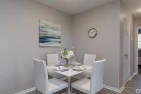 Pottstown apartment for rent - A dining room with a white table and chairs.