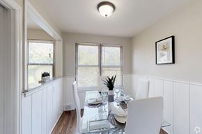 Collingswood apartment for rent - A dining room with a table set for two.