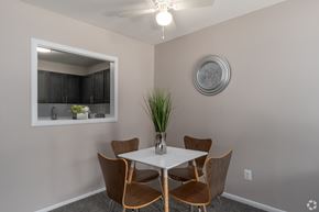 Glassboro apartment for rent - A dining room with a white table and chairs.