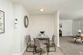 Glenolden apartment for rent - A dining room with a glass table and chairs.