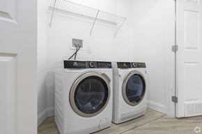 Allentown apartment for rent - Two front load washing machines in a laundry room.