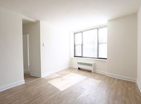 Philadelphia apartment for rent - A room with a window and a radiator on the floor.