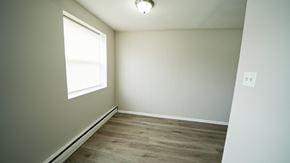 Philadelphia apartment for rent - A room with a window and wooden flooring.