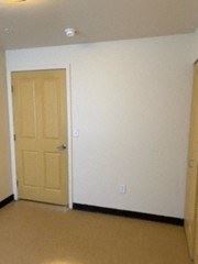 Fort Morgan townhouse for rent - a room with a white wall and a door