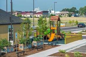 Fort Morgan townhouse for rent - a playground in a park next to a building